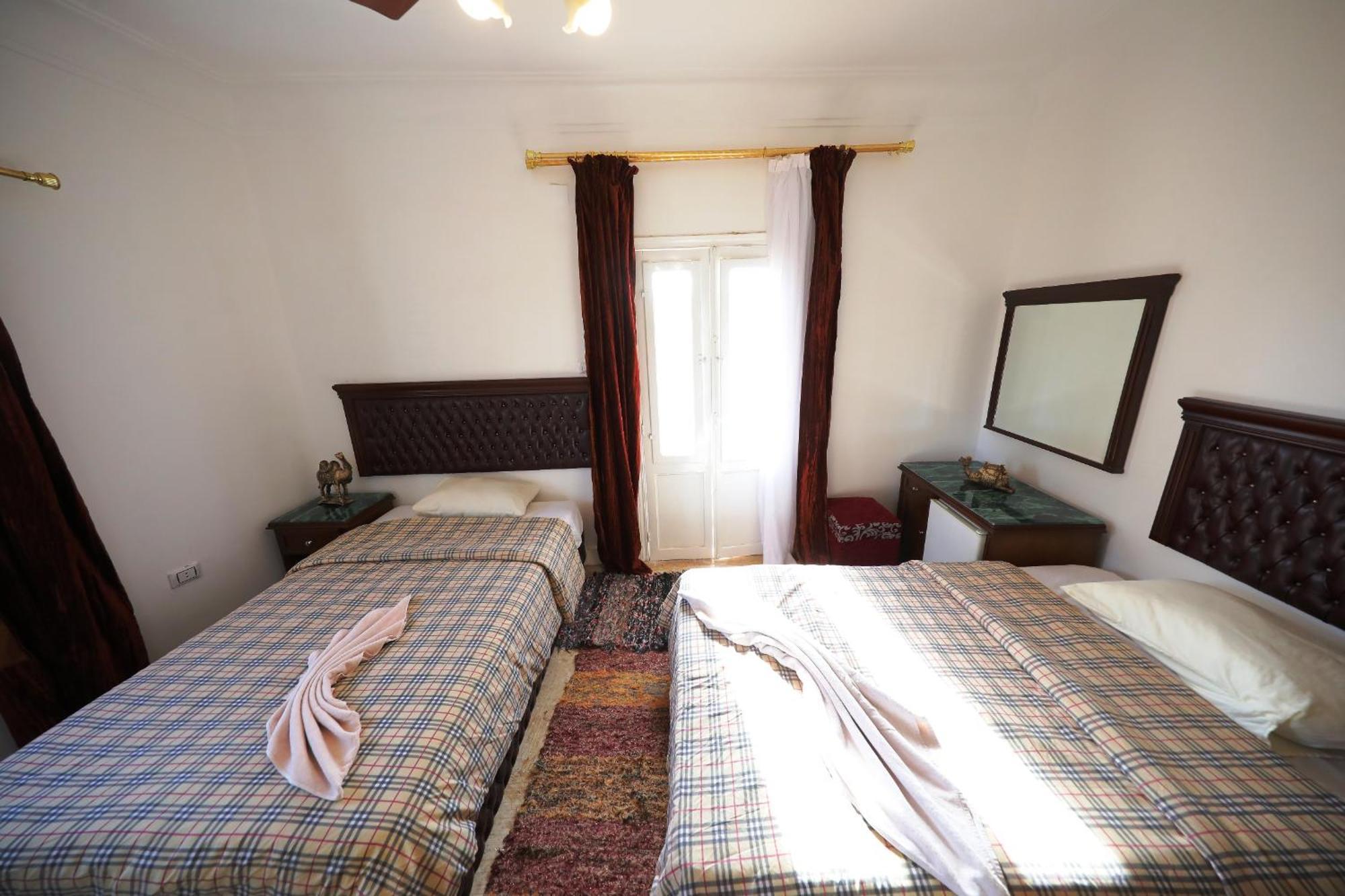 Pyramids Loft Guesthouse Il Il Cairo Camera foto