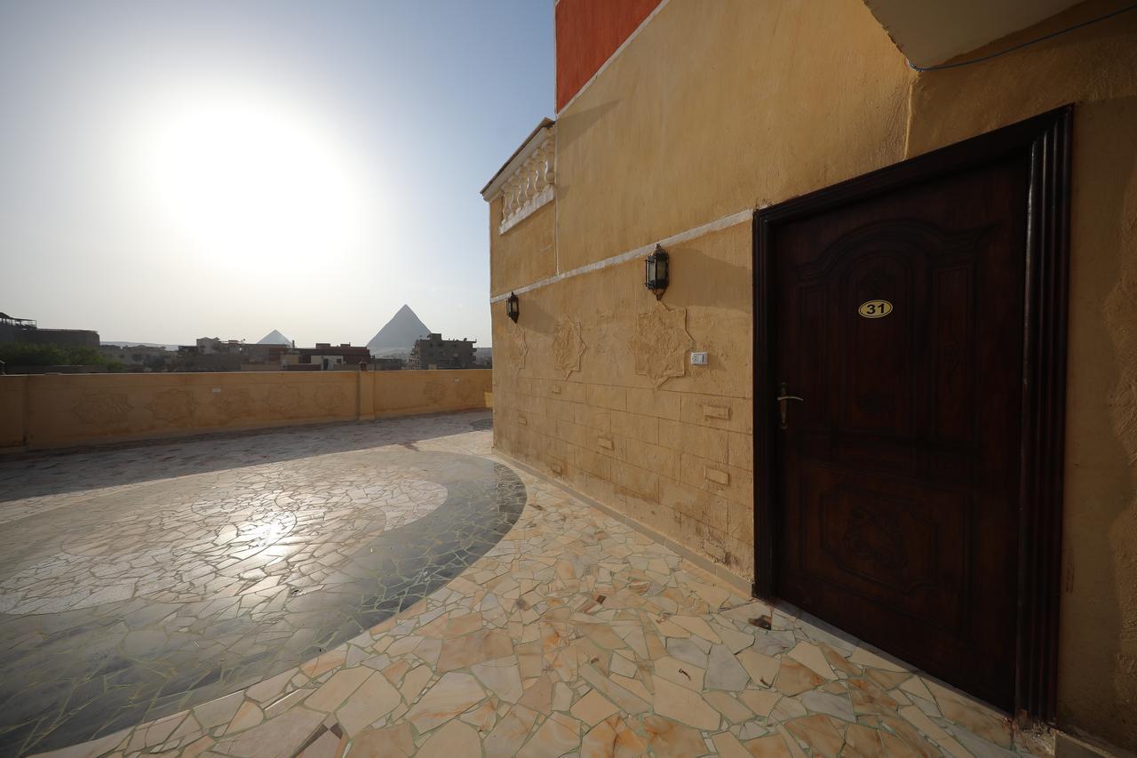 Pyramids Loft Guesthouse Il Il Cairo Esterno foto