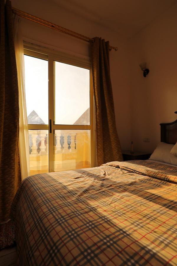 Pyramids Loft Guesthouse Il Il Cairo Esterno foto