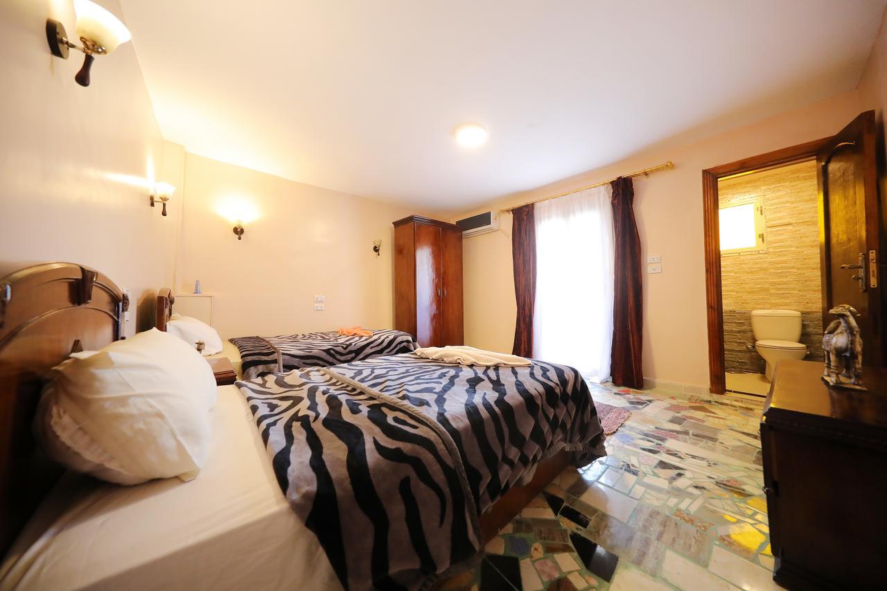 Pyramids Loft Guesthouse Il Il Cairo Esterno foto